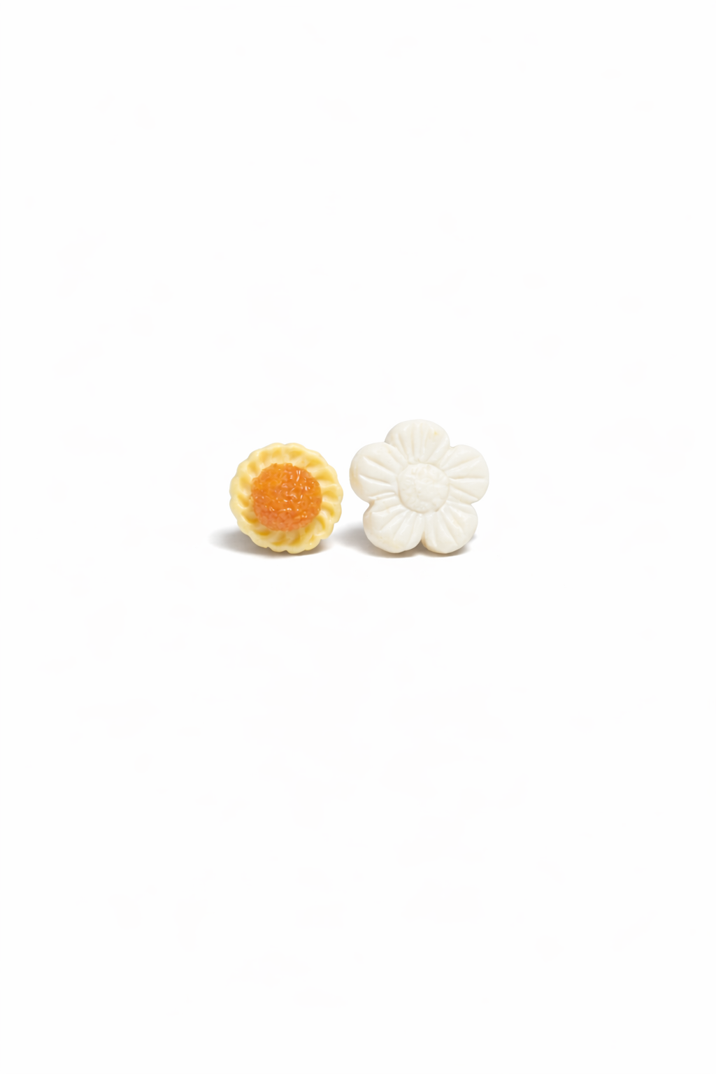 Kueh Bangkit and Pineapple Tart Studs (a variety)