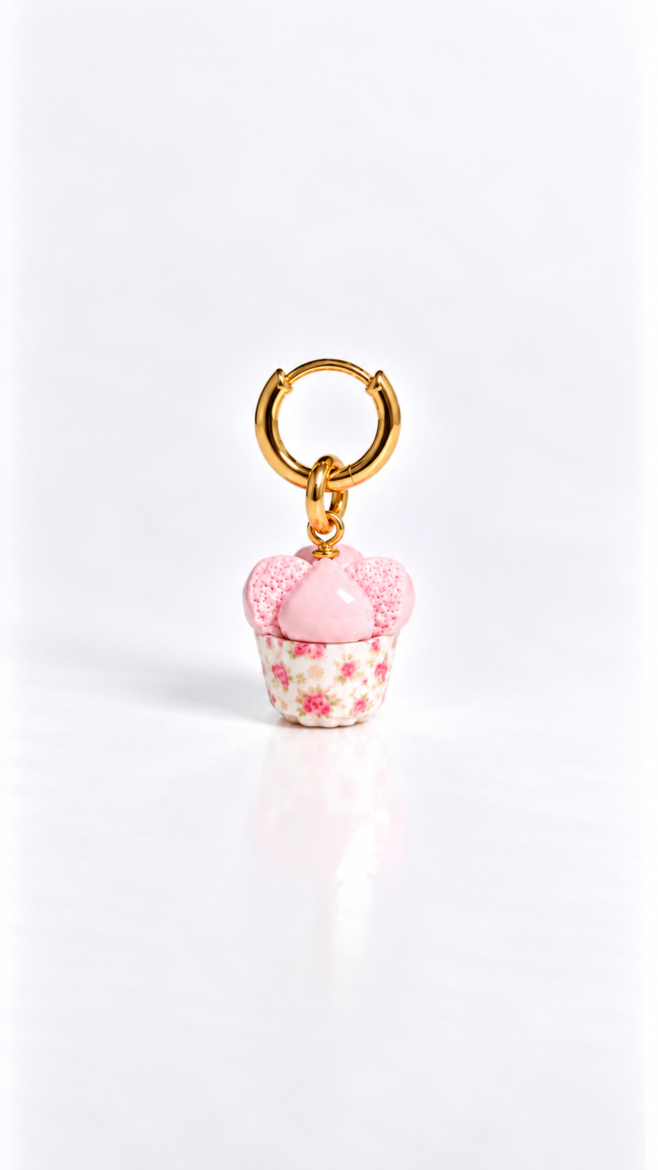 Huat kueh vintage floral charm clipped onto a hoop earring, miniature food earrings