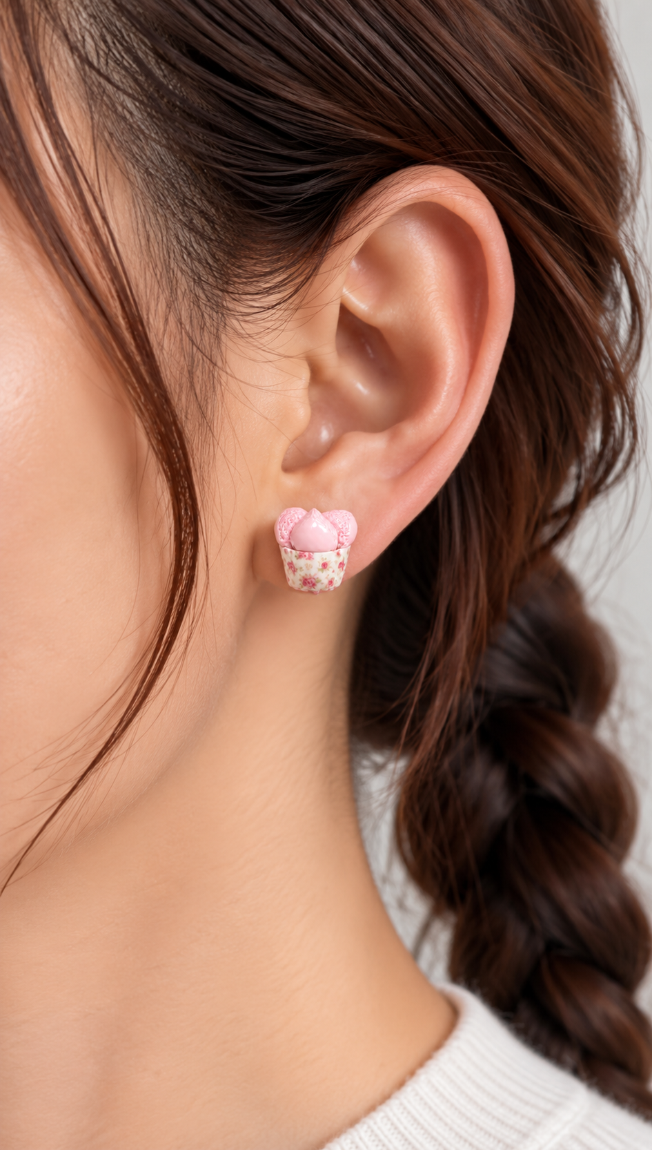 Model wearing huat kueh miniature food earrings in vintage floral