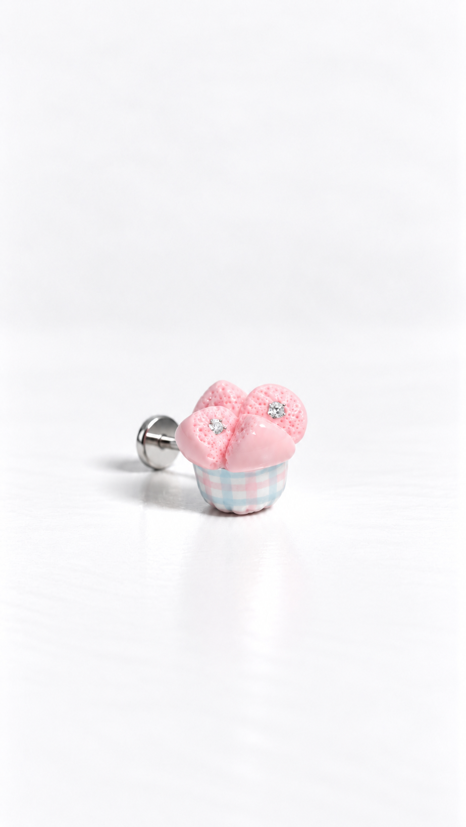 Side view of handsculpted huat kueh miniature charm in gingham