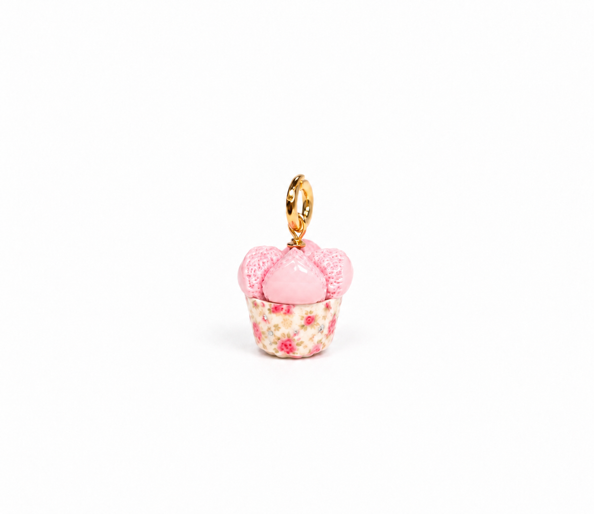 Close-up of a handsculpted huat kueh polymer clay charm in vintage floral