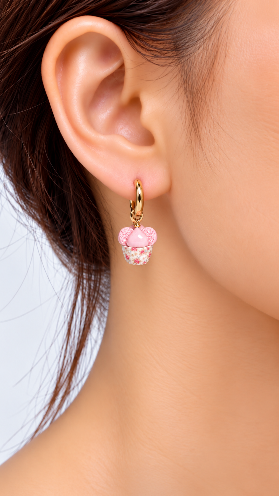 Model wearing huat kueh miniature food earrings in vintage floral with moissanites