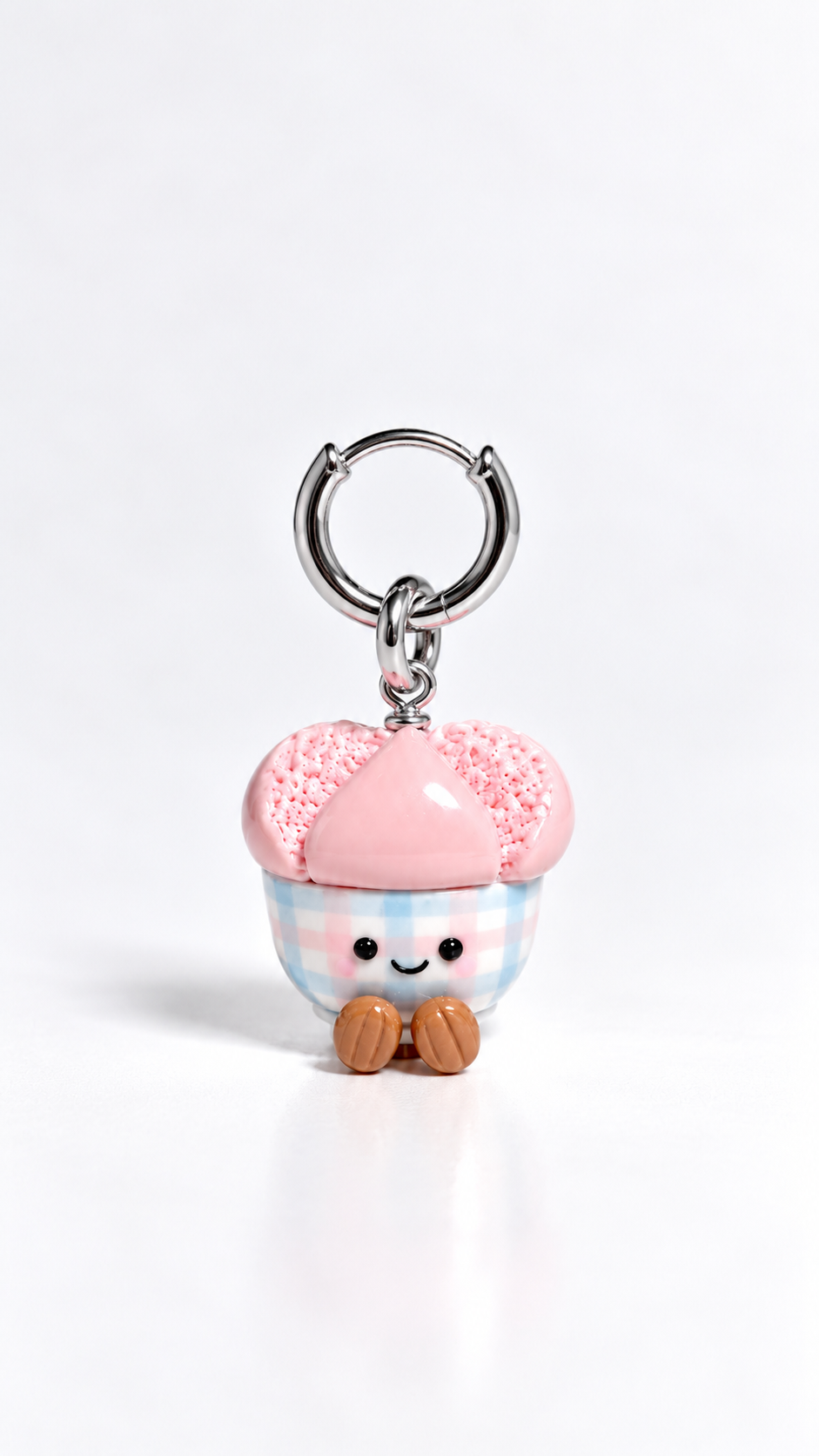 Smiley huat kueh gingham charm clipped onto a hoop earring, cute food earrings
