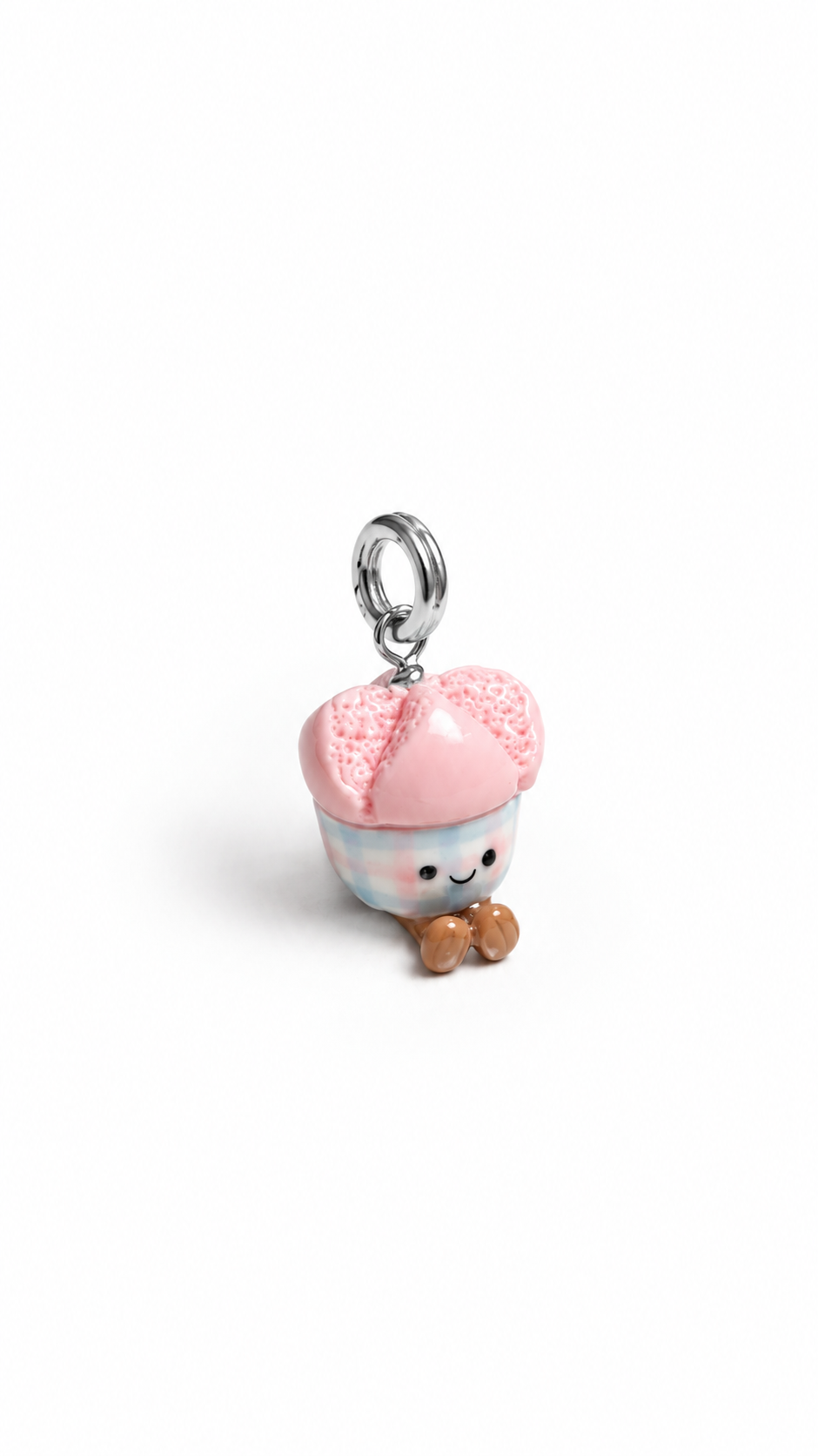 Side view of smiley huat kueh miniature charm in gingham